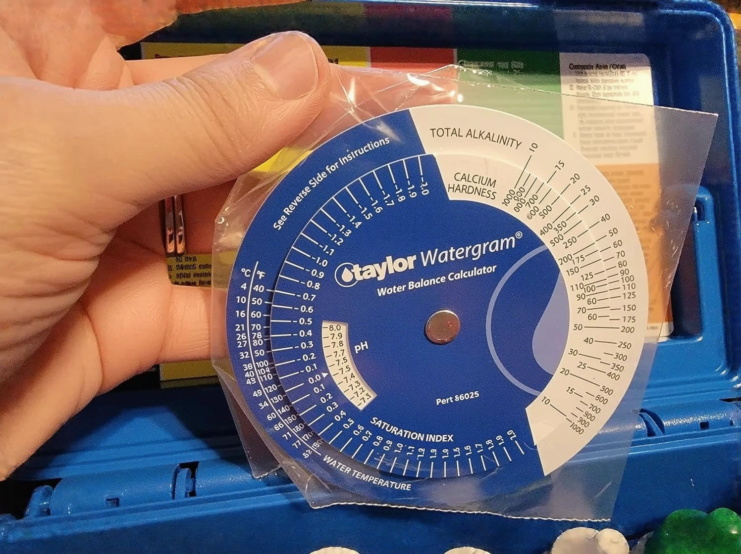 Customer photo of chlorine test kit results showing free, combined, and total chlorine color comparisons