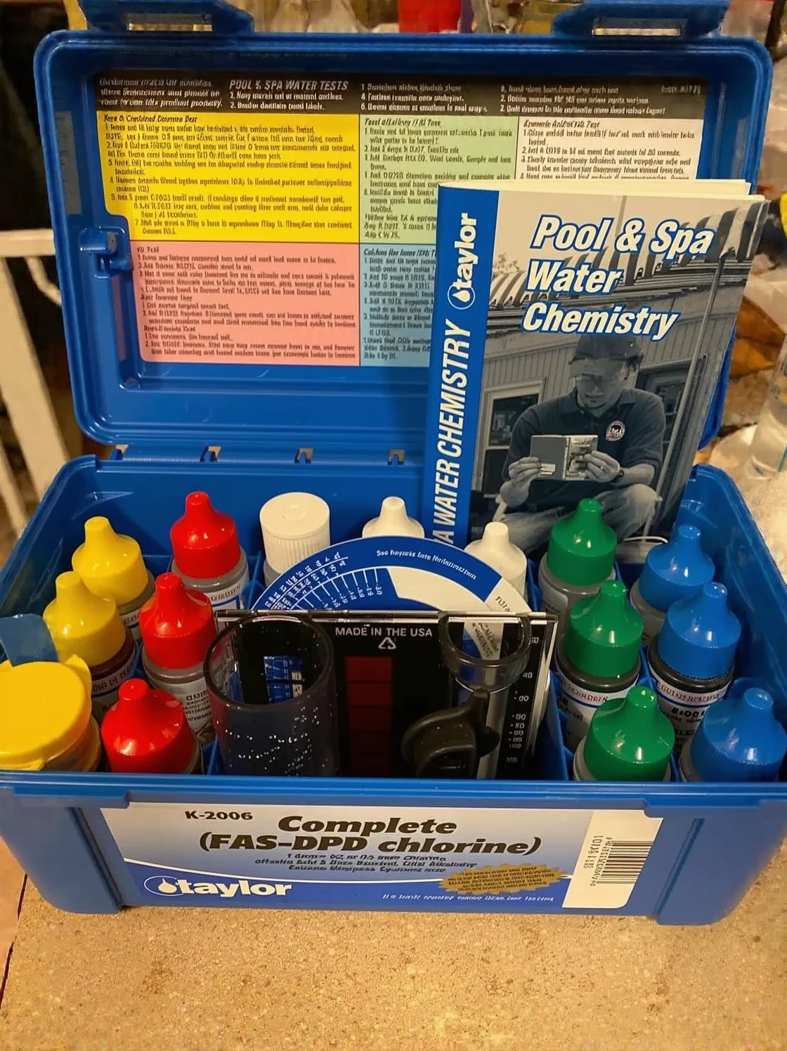 Customer photo of chlorine test kit results showing color-matched vials for free and total chlorine readings