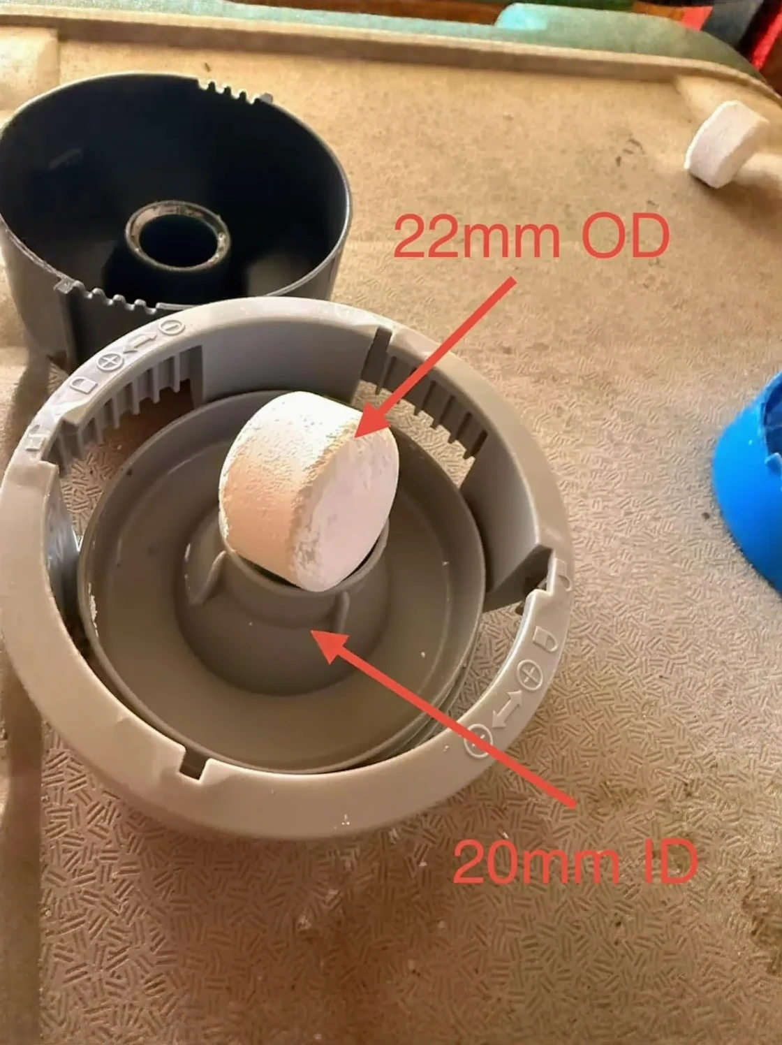 Customer photo showing bromine tablets and chlorine granules side by side for hot tub comparison