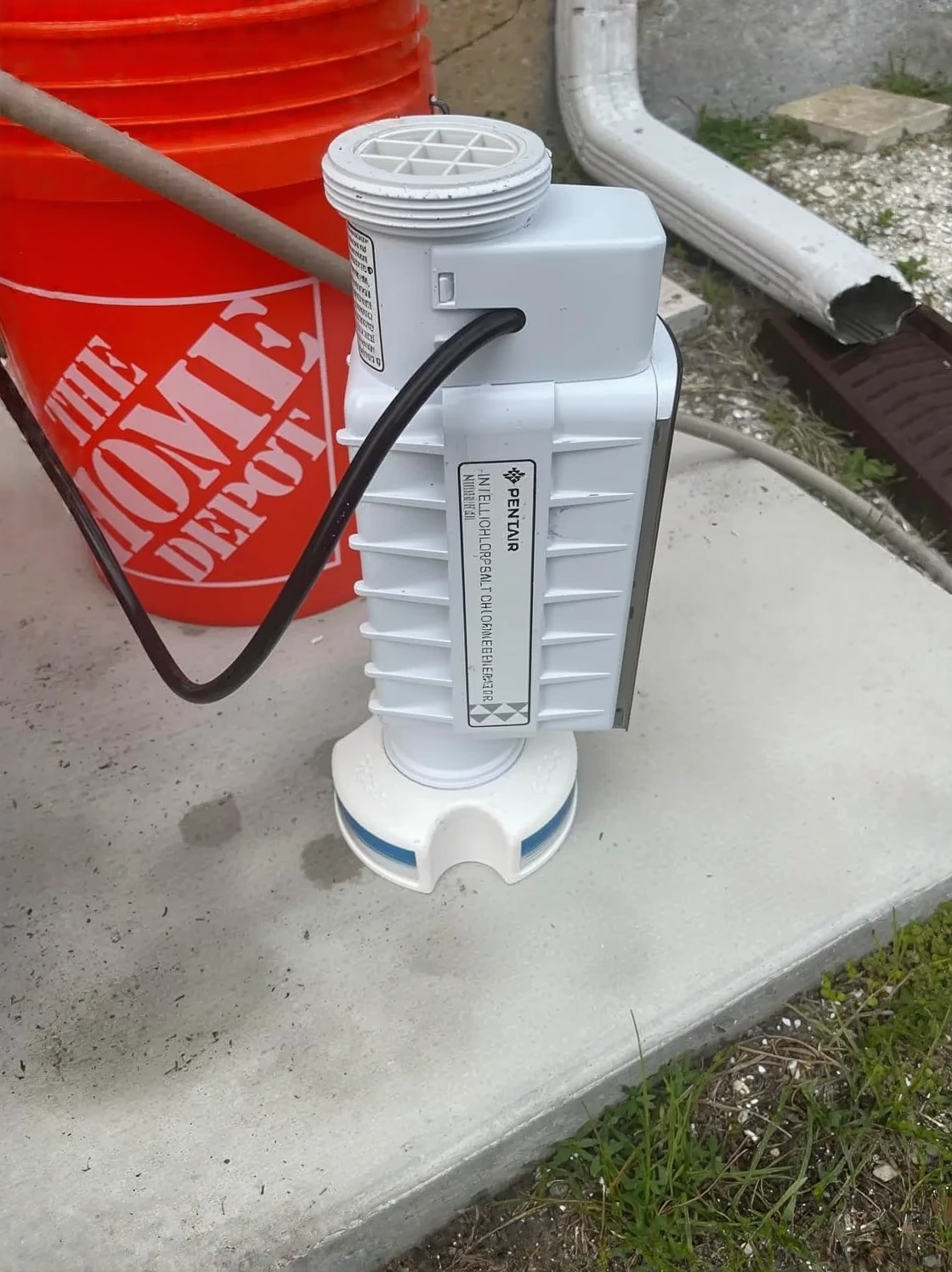 Customer photo showing salt cell after cleaning with visible mineral deposits and buildup