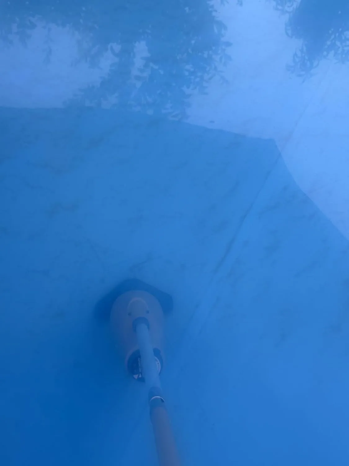 Customer photo of pool vacuum in use cleaning above-ground pool water