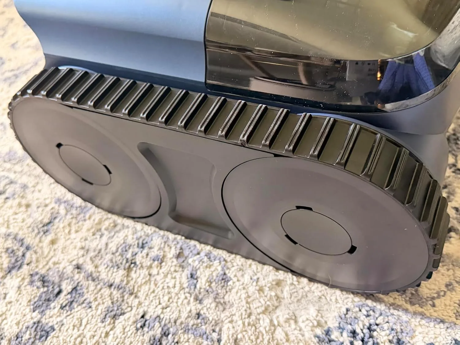 Customer photo of robotic pool cleaner operating on pool floor during cleaning cycle